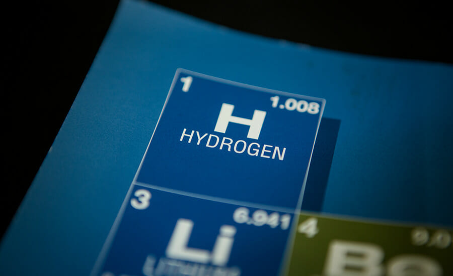 Un tableau périodique avec le mot hydrogène dessus.