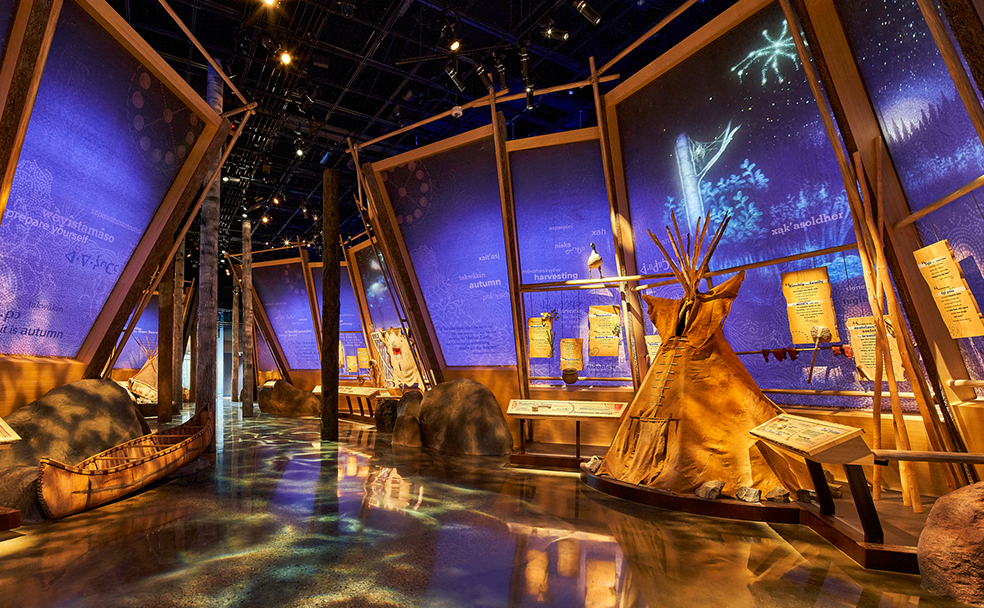 A museum with a display of native american artifacts.