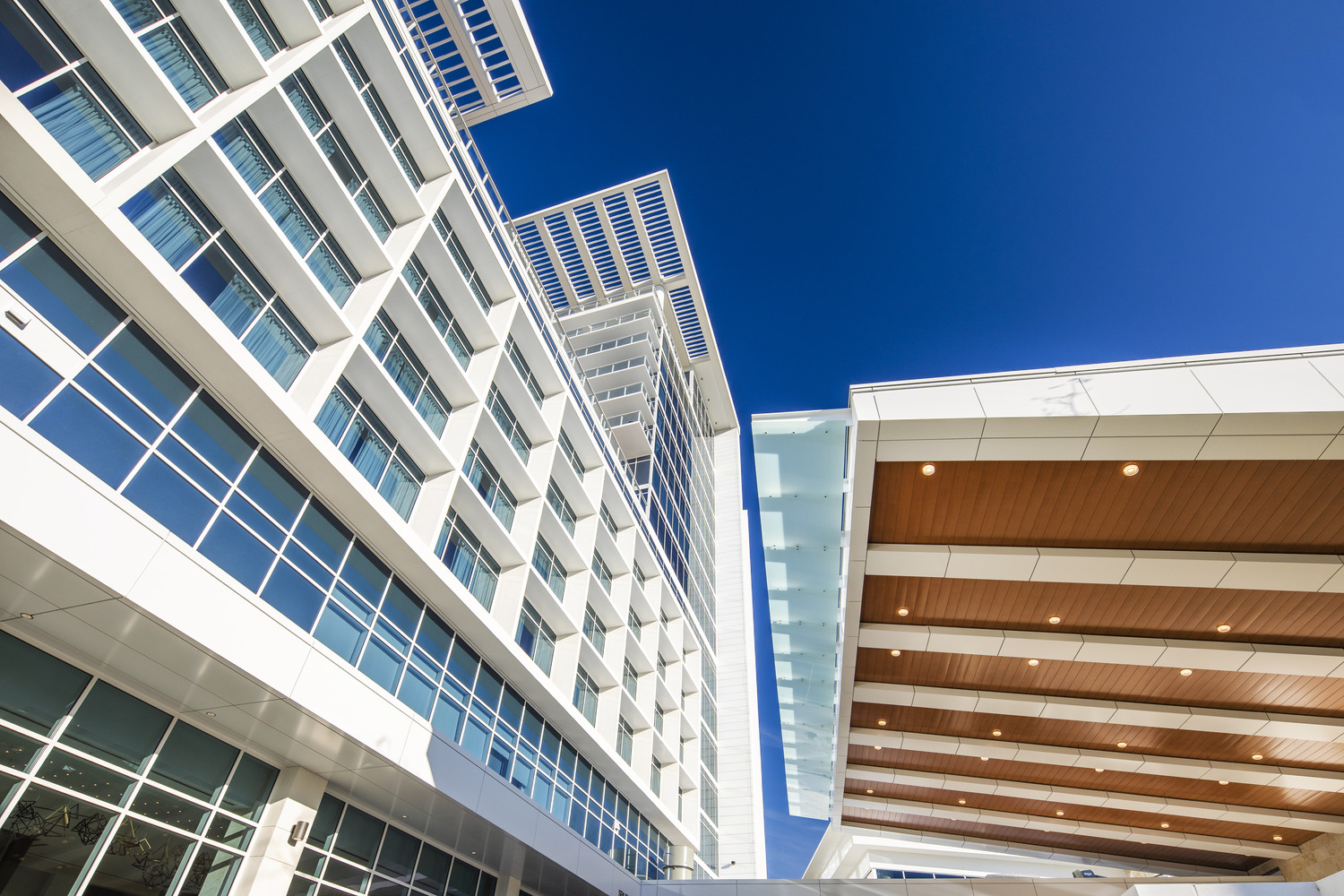 A view of a modern building with a glass roof.